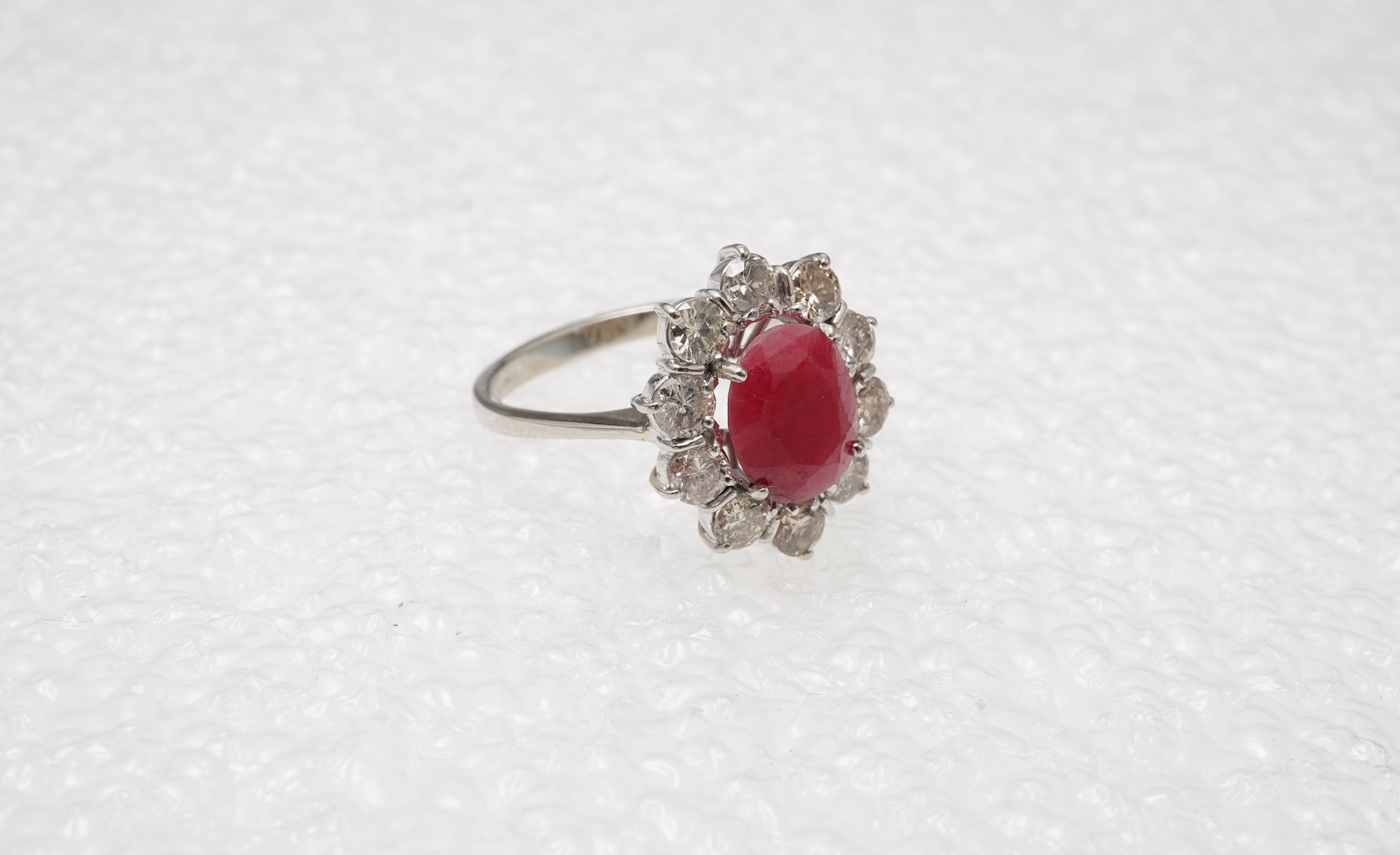 A ruby and diamond cluster ring